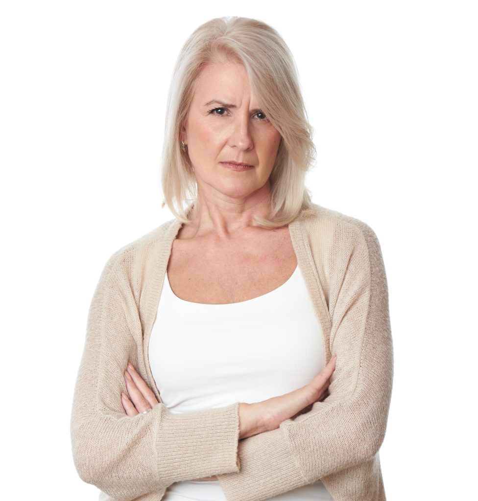 Angry senior woman upset