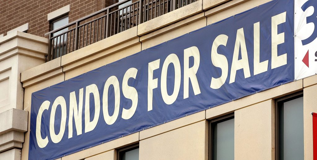 "Condos For Sale" signage in Chicago