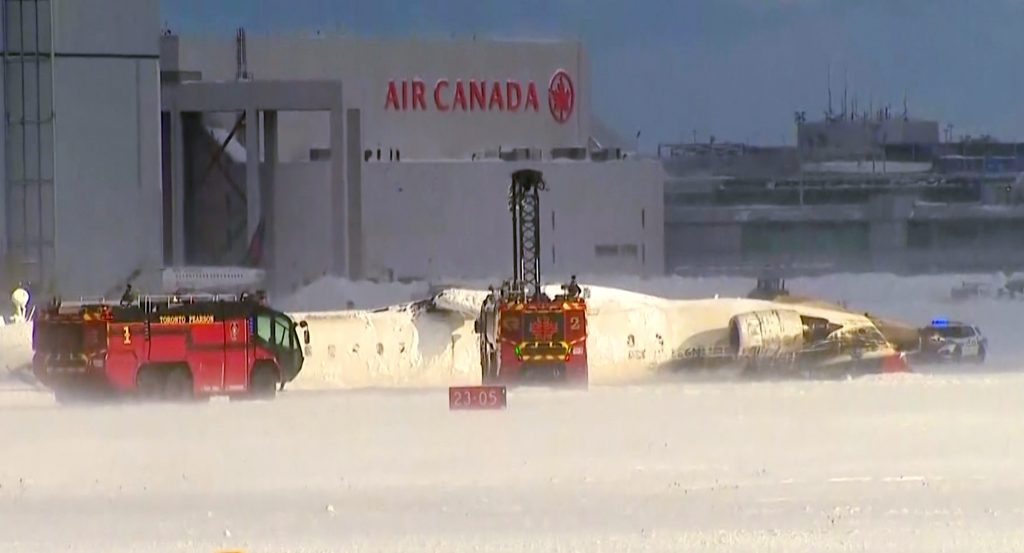 Toronto plane crash passenger describes "mass chaos" as aircraft landed