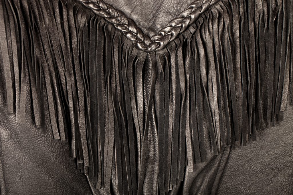 Stock image of biker tassel jacket.